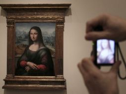 Anteriormente con un fondo negro, la restauración permitió descubrir el paisaje oculto. EFE  /