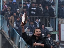 La quema de materiales religiosos islámicos por parte de soldados de EU causó ira entre miles de afganos que salieron a protestar. AFP  /