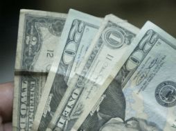 Algunas sucursales de ciudades en el norte de México, terminaron con 12.21 pesos como mínimo a la compra. ARCHIVO  /