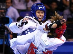 El duelo se definió con apenas un punto de diferencia a favor de la 'azteca', quien busca un boleto a Londres 2012. NOTIMEX  /