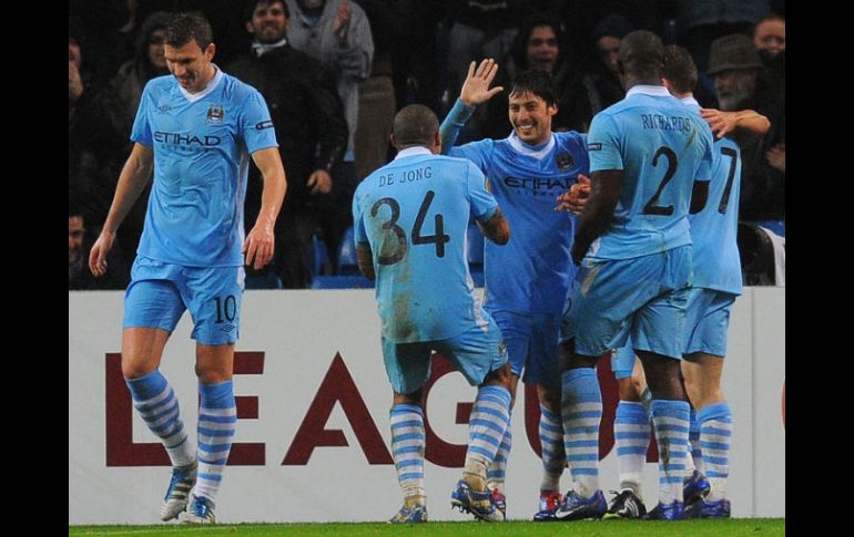 Todo apunta a que el técnico italiano vuelve a contar con Carlos Tévez de cara a un tramo final de la Premier League. AFP  /