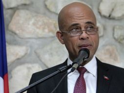 Martelly dijo lamentar que la dimisión de Conille se produzca justo en el momento en que su país estaba a punto de levantarse.  /