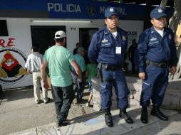 Se localizó una pistola en el pantalón de una de las víctimas.  /