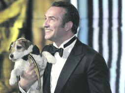 SONRISA FRANCESA. Jean Dujardin se convirtió en una de las grandes revelaciones de Hollywood, al levantar el premio a Mejor actor.  /