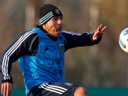 Tévez, de 28 años, se ha entrenado solo desde que regresó hace dos semanas a Inglaterra. AP  /