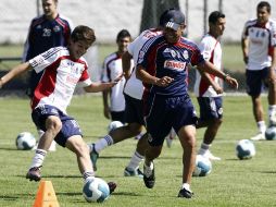 Carlos Fierro y el técnico Ignacio Ambriz fueron captados durante la práctica del Rebaño. MEXSPORT  /