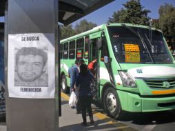 Carteles pegados en donde trabajaba 'el Coqueto' fueron colocados para acelerar su captura. UNIVERSAL  /