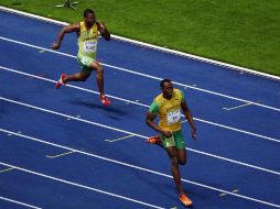 Boltón (izq) se volverá a encarar con su compatriota Powell (der) el próximo 31 de mayo. MEXSPORT  /