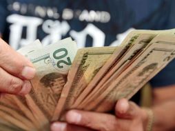 En casas de cambio de Mérida, alcanzó una cotización máxima a la venta de 13.09 pesos. ARCHIVO  /