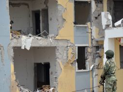 Las explosiones causaron también enormes daños en un gran número de inmuebles de Kinshasa. AFP  /