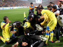 Los jugadores del Apoel celebran su pase a los cuartos de final de la Champions. AFP  /