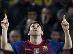 Leo festeja su segunda anotación, antes de finalizar el primer tiempo. REUTERS  /