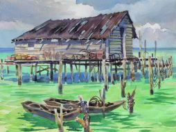 Dos escenarios. Sobre el mar, Banco Chinchorro luce quieto; bajo él, una enorme población embellece las profundidades.  /