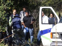 Agentes investigadores del IJCF  encontraron rastros de sangre que provenía de una finca cercana al lugar del hallazgo.  /