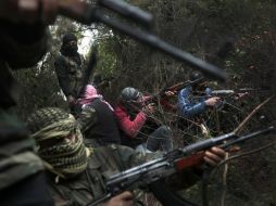 Rebeldes sirios en Idlib. El ejército sirio ha retomado la mayor parte del reducto rebelde en la zona. AFP  /