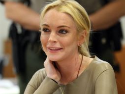 Lohan todavía debe completar 14 días de trabajo en la morgue y asistir a cinco sesiones de terapia. AP  /