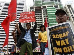 Exigen al gobierno tomar medidas inmediatas para evitar supuestamente la sobrefacturación de productos derivados del petróleo. AP  /