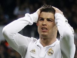 Crisitano Ronaldo lamenta una falla durante el partido con el Málaga. REUTERS  /
