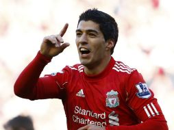 En febrero de 2011, Suárez, ganó la Copa América con la selección de su país, se hizo con el primer título con los reds''. REUTERS  /