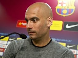 Josep Guardiola, durante la rueda de prensa que ofreció en la ciudad deportiva Joan Gamper. EFE  /