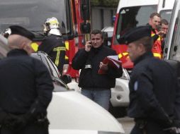 Por horas, el sospechoso se atrinchera en un edificio de departamentos del barrio de Cote Pavé. AP  /