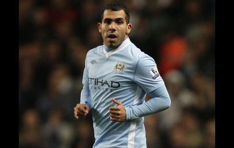 Como no pudo contratar a Tevez, al Milan incorporó al delantero argentino del Catania, Maxi López. AP  /