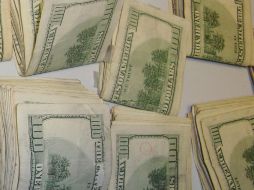 Casas cambiarias de Mérida vendieron la moneda estadounidense en   12.06 pesos. ARCHIVO  /