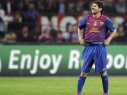 Más de mil aficionados asistieron a la práctica del conjunto azulgrana en centro deportivo de Milán. AFP  /