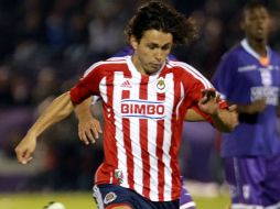 Arellano no terminó el encuentro de ayer entre Chivas y Defensor Sporting por molestias musculares. EFE  /