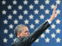 Barack Obama saluda a partidarios en un evento de campaña en el Colegio del Sur de la Comunidad de Maine, en Portland. AFP  /