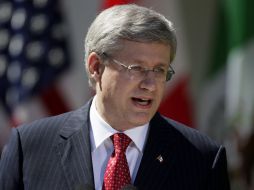 El Primer Ministro de Canadá dio una rueda de prensa en el Jardín de las Rosas de la Casa Blanca. AP  /