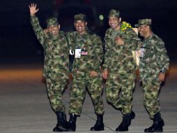 Los cuatro militares liberados no se imaginaban que hoy mismo quedarían en libertad. AP  /