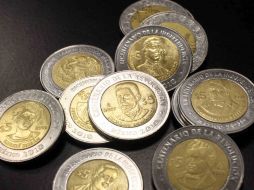 El precio final del banco central para el martes fue de 12.7991 pesos. ARCHIVO  /