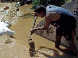 La torrencial lluvia afectó a habitantes en zonas de riesgo. ARCHIVO  /