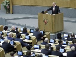 El primer ministro y presidente electo de Rusia, Vladímir Putin, presenta su informe  ante la Duma. EFE  /