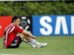 Kristian Álvarez luce desconcertado luego de la derrota del Guadalajara. MEXSPORT  /
