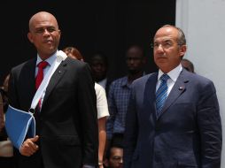El presidente de Haití, Michel Martelly (i), y su homólogo mexicano, Felipe Calderón (d). EFE  /