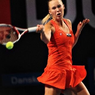 Wozniacki avanza sin problemas a cuartos de final