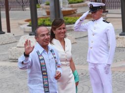 Felipe Calderón, en compañía de su esposa, Margarita Zavala, llega a la inauguración de la Cumbre de las Américas. NOTIMEX  /