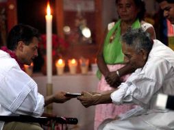 Peña Nieto fue recibido por el presidente de todos los consejos supremos en la llamada Kant' Yan. EL UNIVERSAL  /