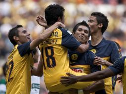 Los jugadores del América celebran el gol de Bemúdez (18) ante Santos. AP  /