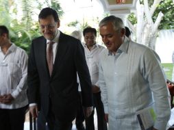 El presidente del Gobierno español, Mariano Rajoy (i) y el presidente de Guatemala, Otto Pérez (d). EFE  /