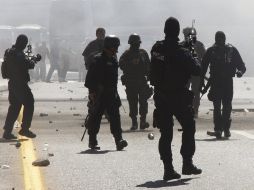 Los inconformes piden justicia para sus compañeros asesinados presuntamente por elementos policiales. ARCHIVO  /