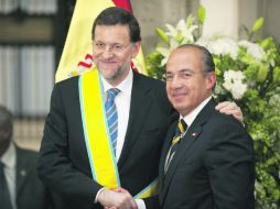 El jefe del Ejecutivo español, Mariano Rajoy, destacó la calidez del Presidente Felipe Calderón. AFP  /