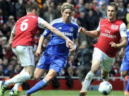 Torres (c) espera que los Blues salgan victoriosos en el partido de mañana, pese a calidad azulgrana. EFE  /