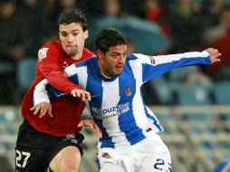 El mexicano es el máximo anotador de la Real Sociedad y dice sentirse feliz de jugar con el equipo. EFE  /