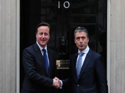 El primer ministro británico, David Cameron y el Secretario General de la OTAN, Anders Fogh Rasmussen. AFP  /
