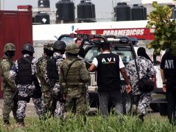 Los cuerpos fueron hallados en bolsas de basura localizadas en una zona habitacional. AFP  /