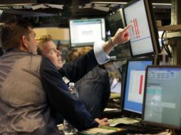 Los indicadores en la Bolsa de Valores de Nueva York operaban hoy con marcadas pérdidas. ARCHIVO  /