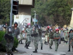 La Junta Militar advirtió ayer en una rueda de prensa de que no tolerará que las protestas se acercasen al Ministerio de Defensa. AFP  /